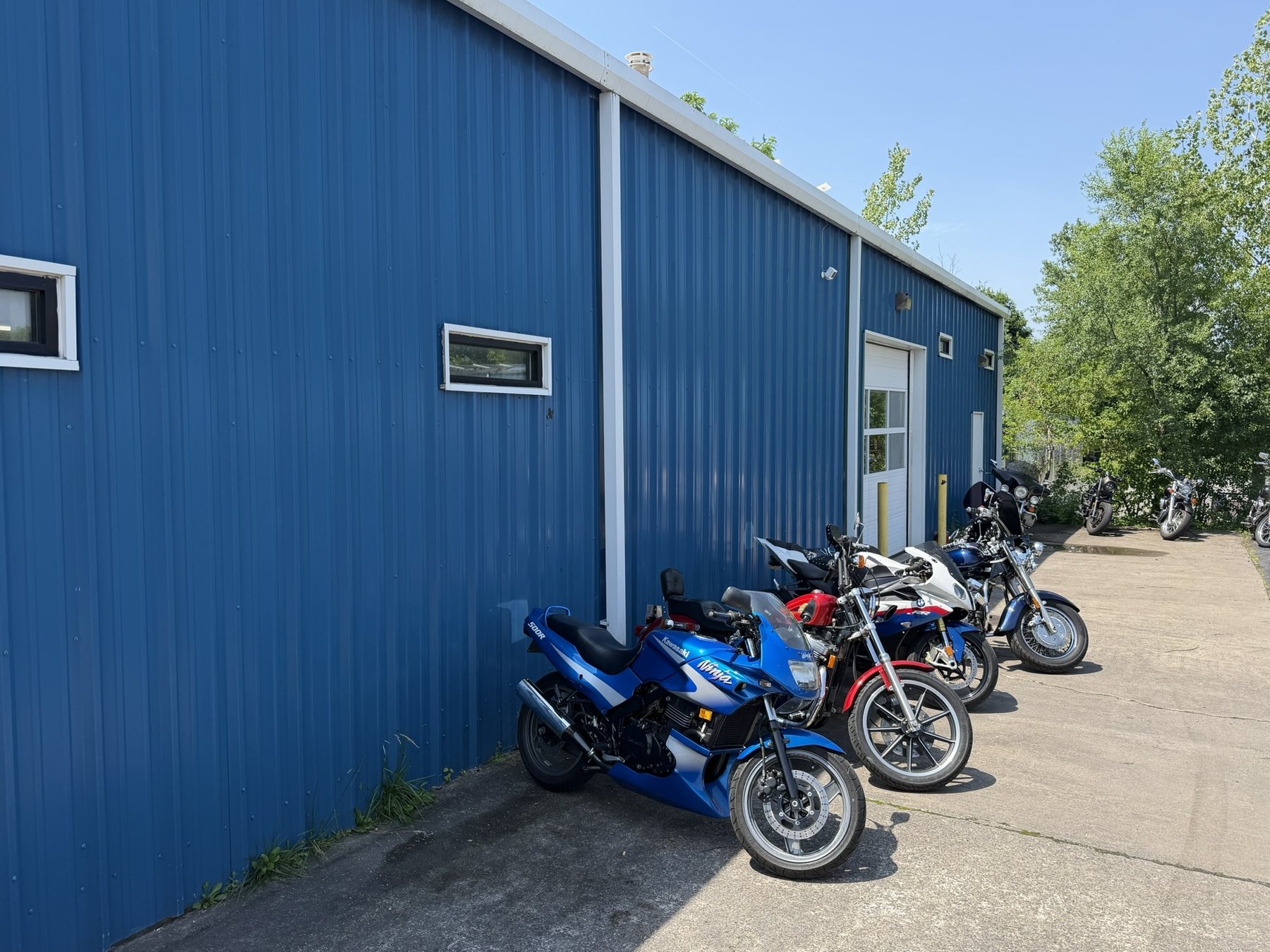 Motorcycles parked outside Total Cycle